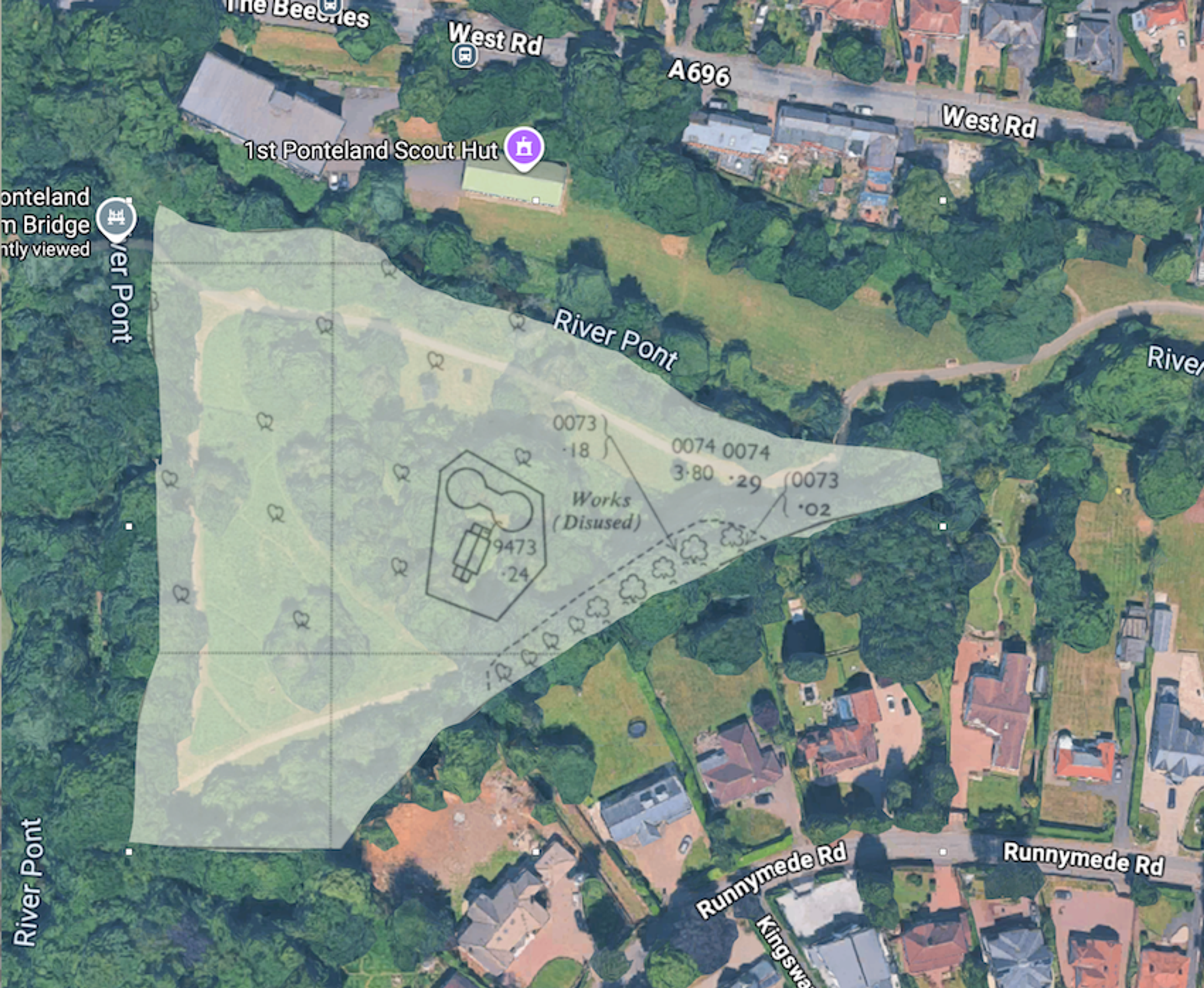Satellite map with a shaded area beside the River Pont marking the site of disused works, surrounded by housing
