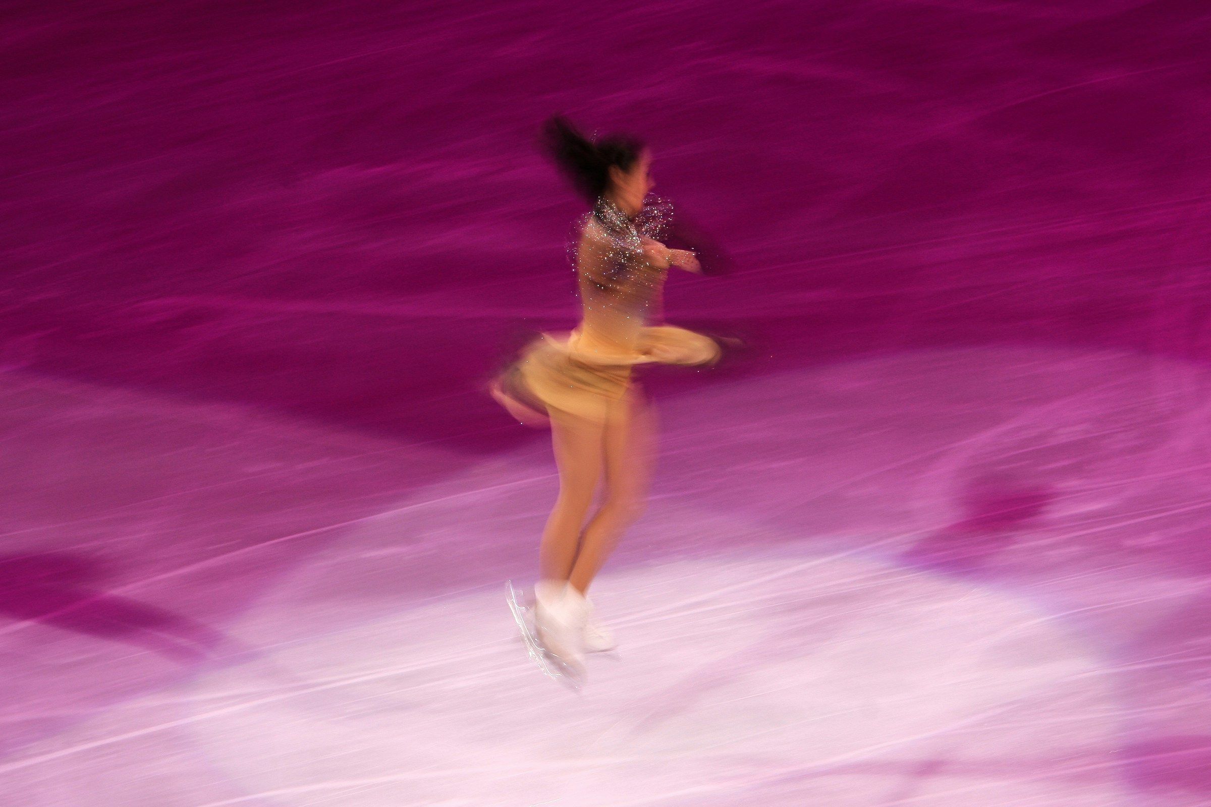 A figure skater performing on the ice