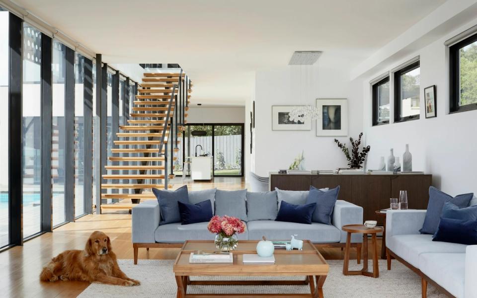 Modern living room with natural light and pale materials