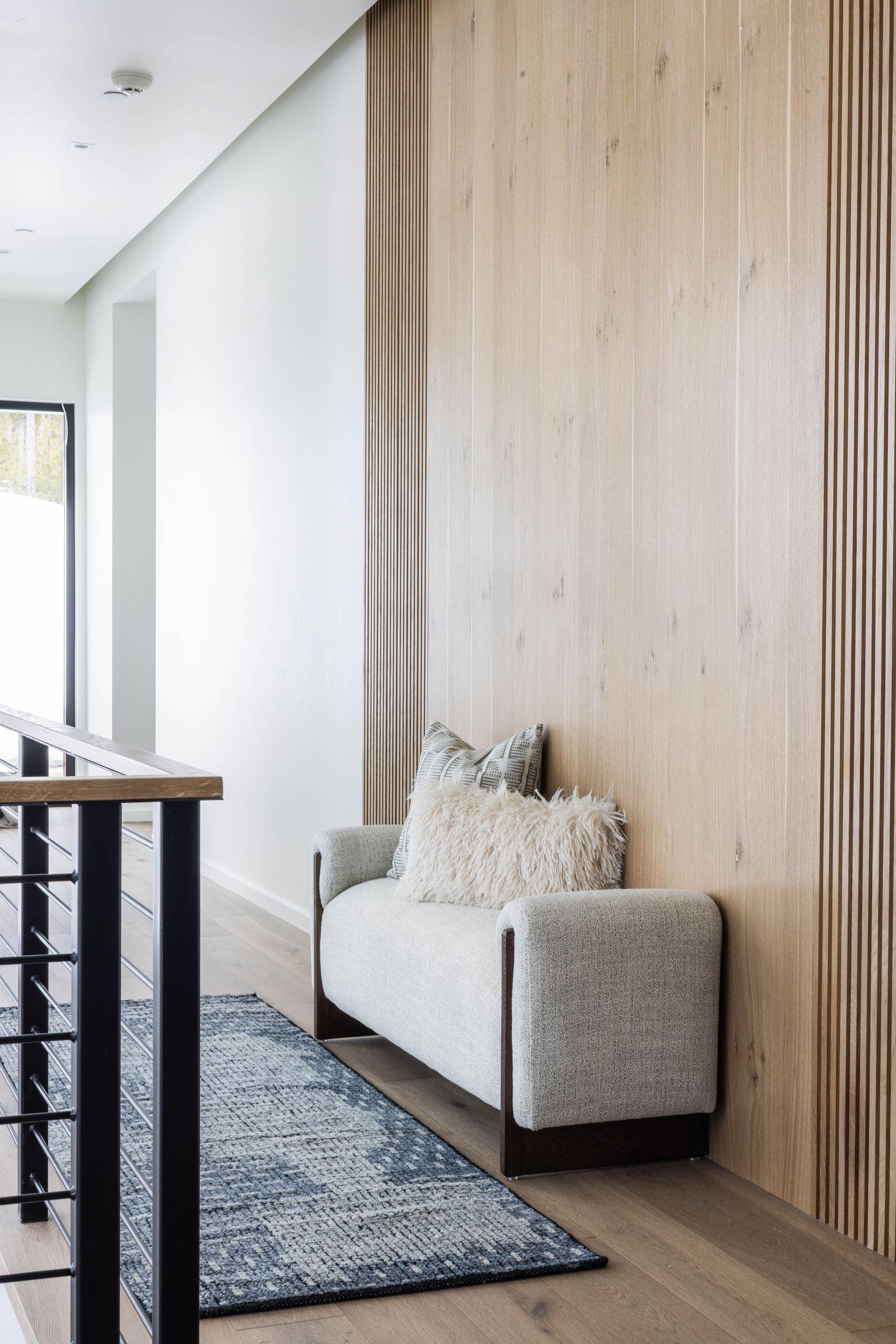 Sitting nook against a slatted timber wall, Highlands residence