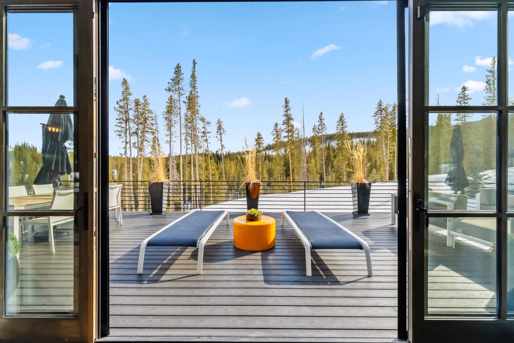 Rooftop patio of a custom mountain home overlooking the Tenmile Range