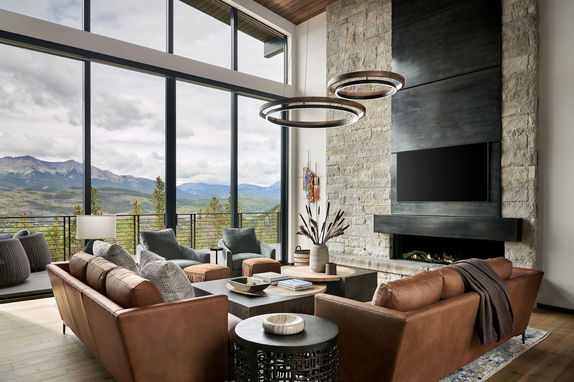 Living room looking out to the mountains through black steel windows