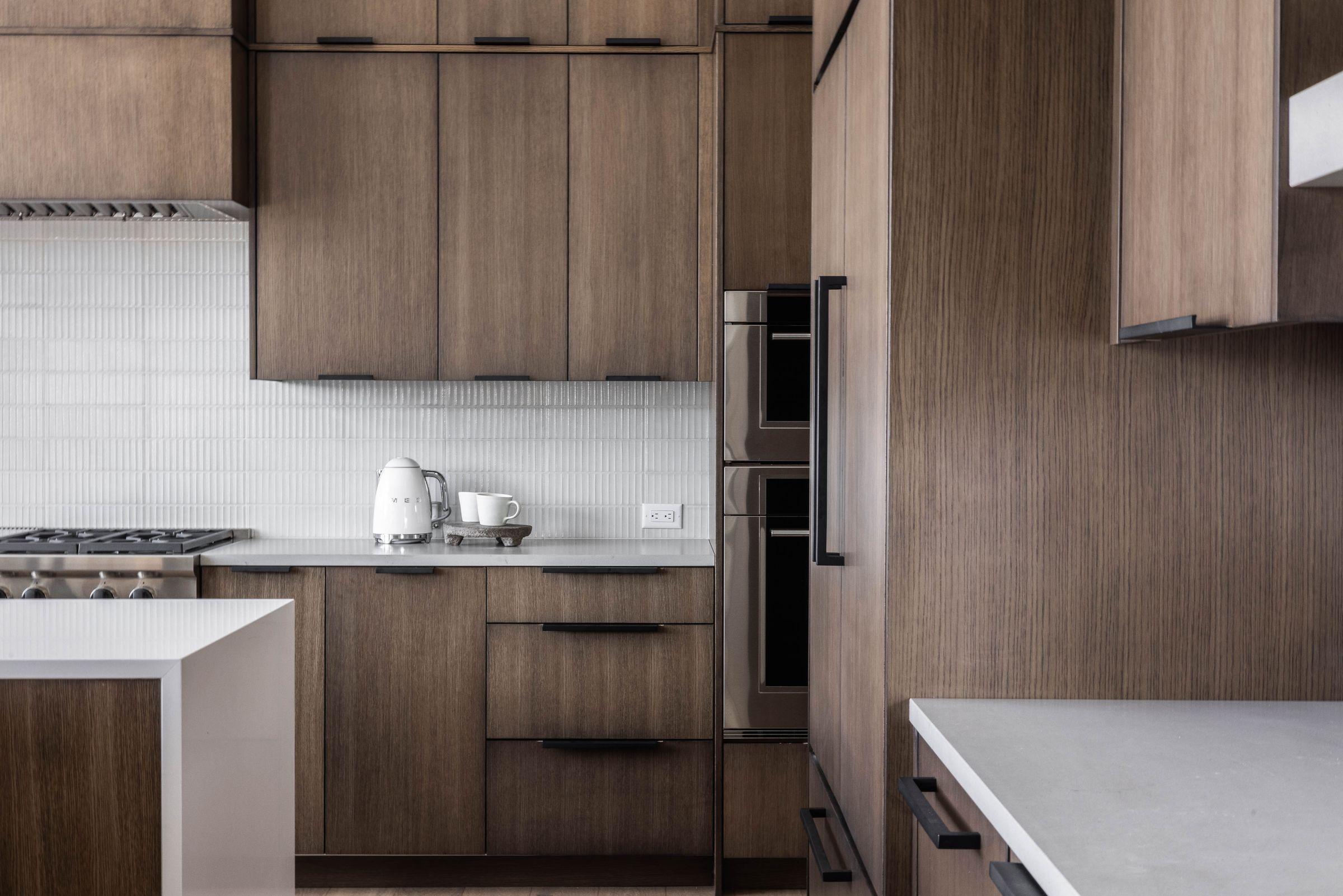 Kitchen detail in timber cabinetry around the range