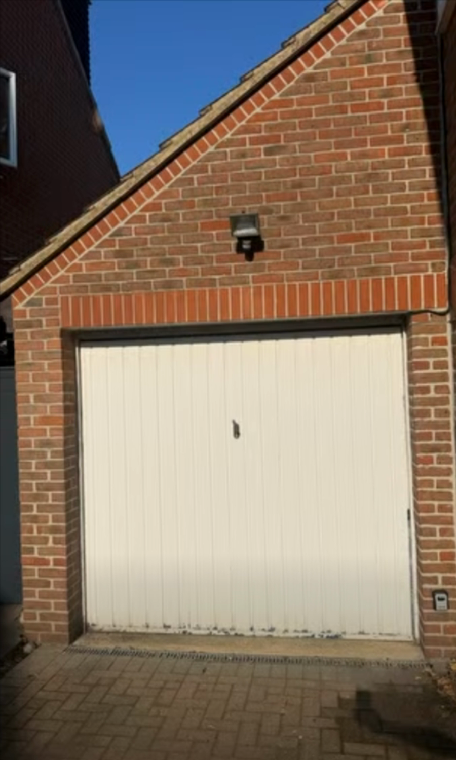 Original white up & over garage door in Church Langley before replacement
