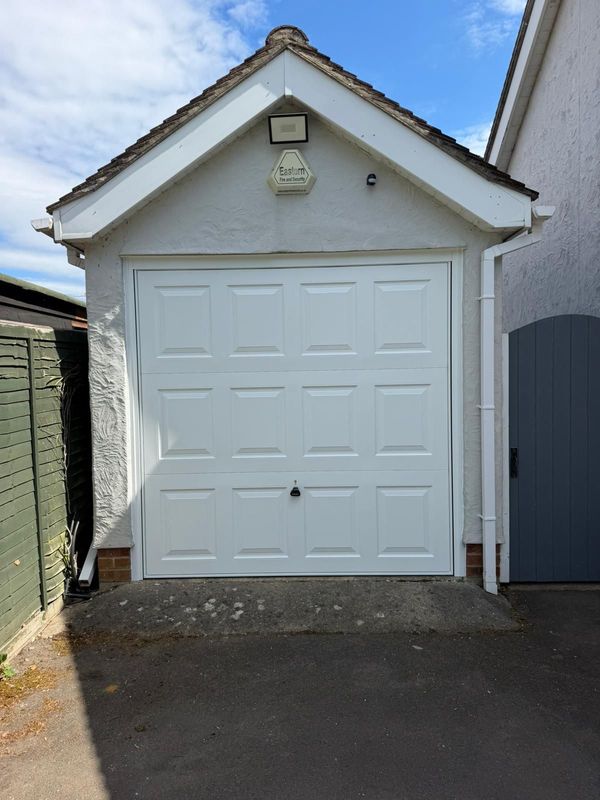 New white Garador Steel Beaumont framed canopy up-and-over garage door in Bishop's Stortford