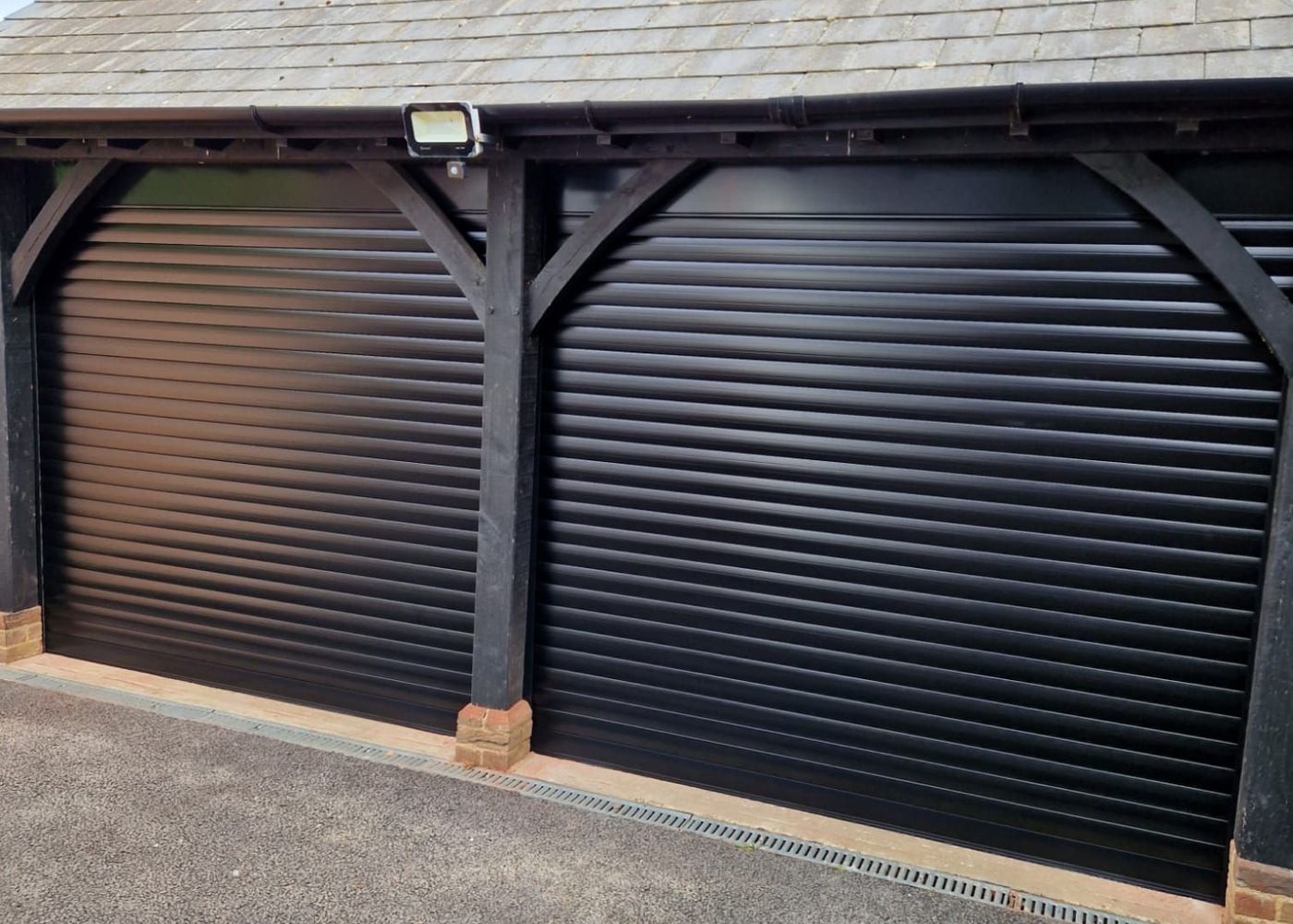 Manor Garage Doors engineer servicing a garage door