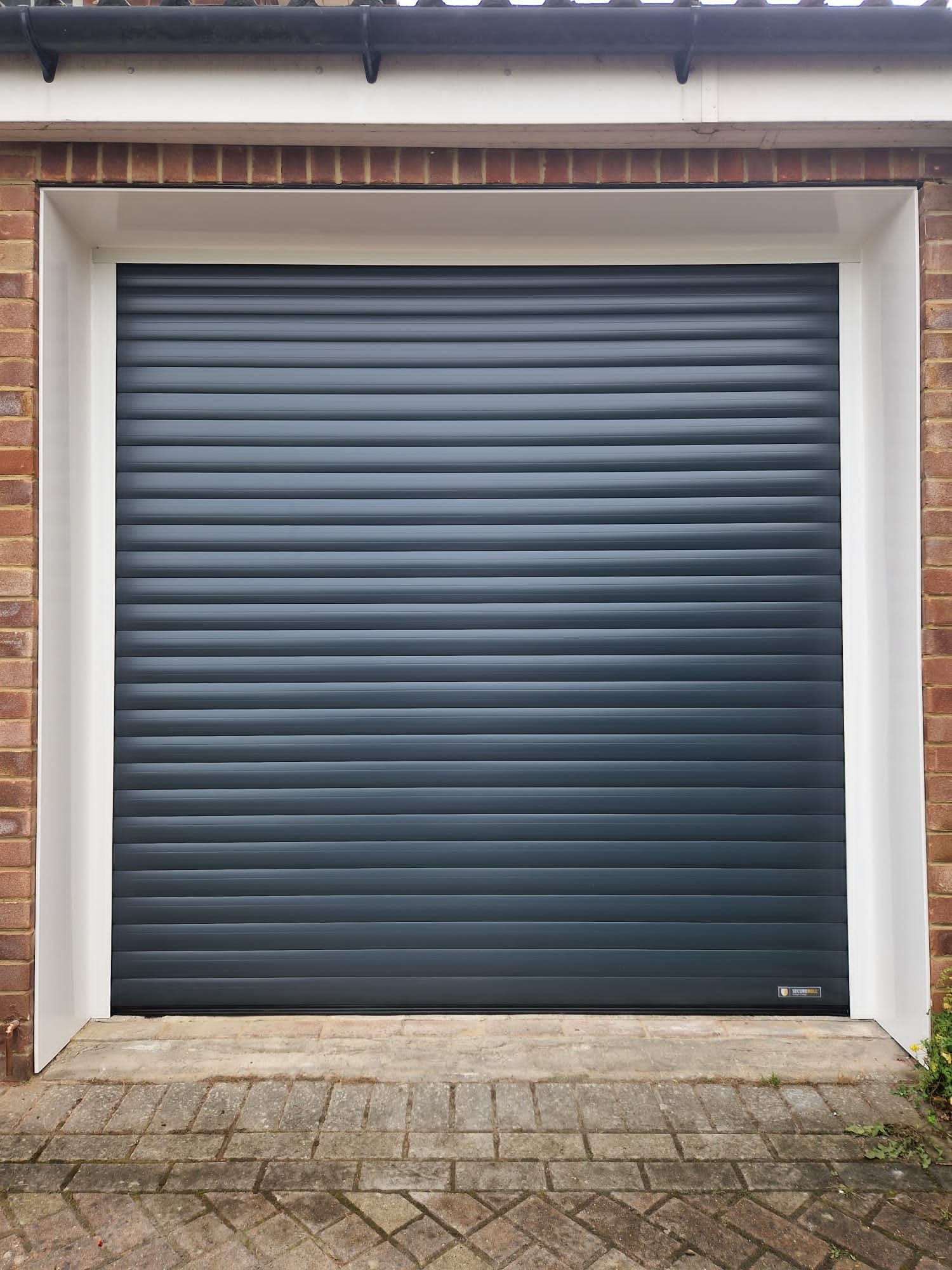 Somfy-powered roller garage door