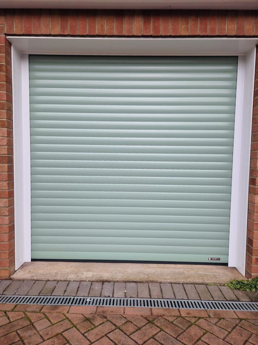 Sage green roller garage door