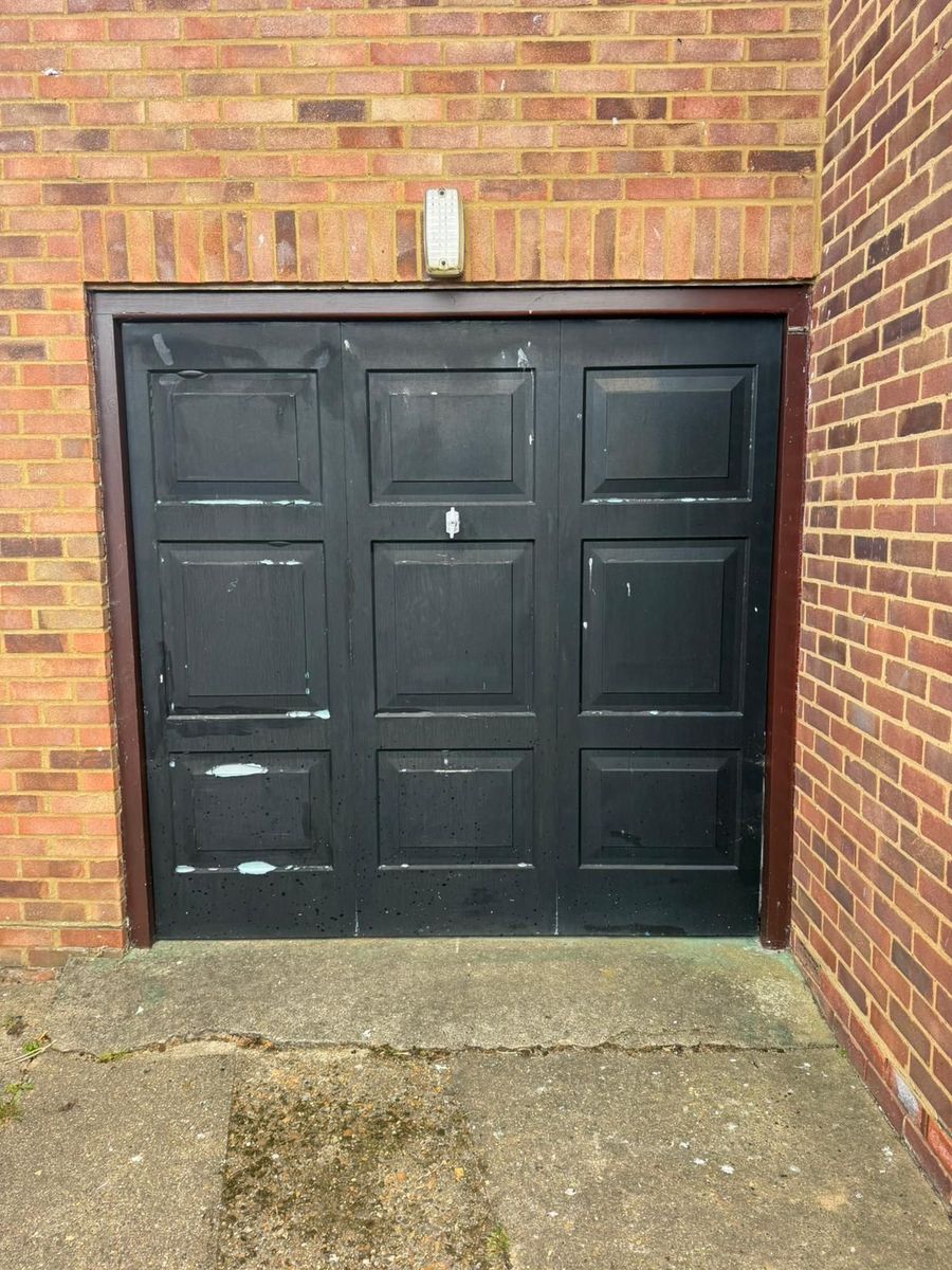 End-of-life Henderson up-and-over garage door in Hertford before replacement
