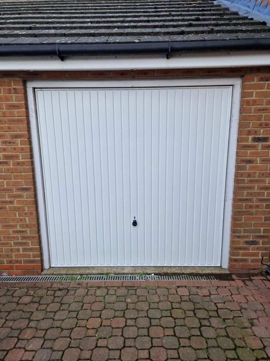 White up-and-over garage door