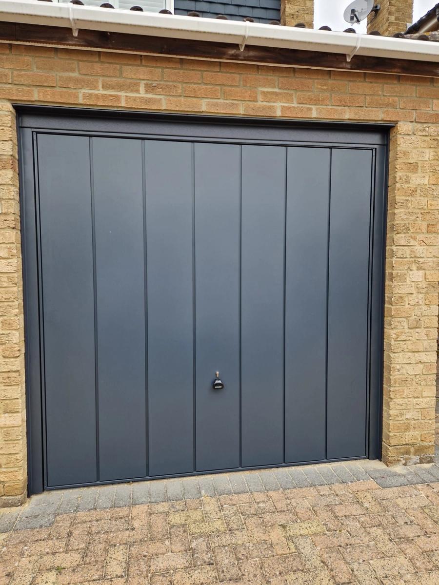 Grey up-and-over garage door