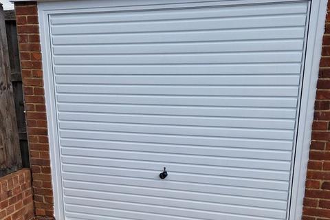 Manually operated garage door