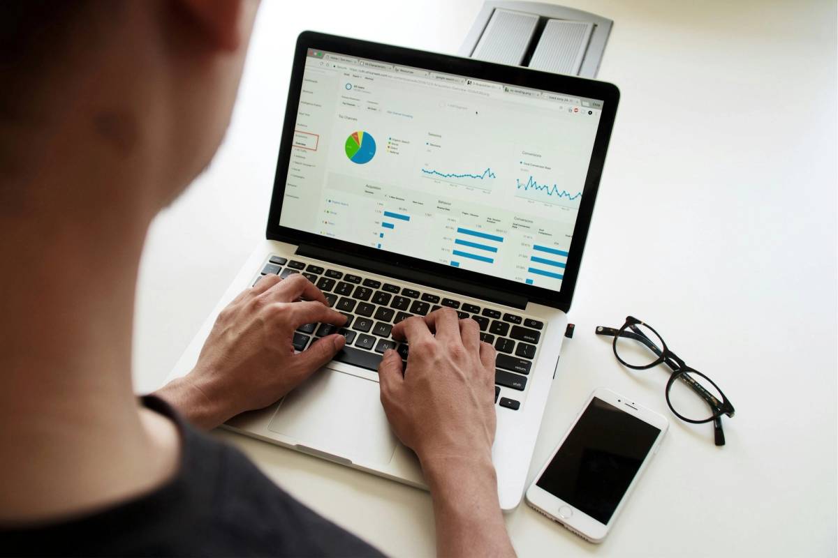 Operations manager reviewing an internal dashboard while weighing Retool vs custom internal tools