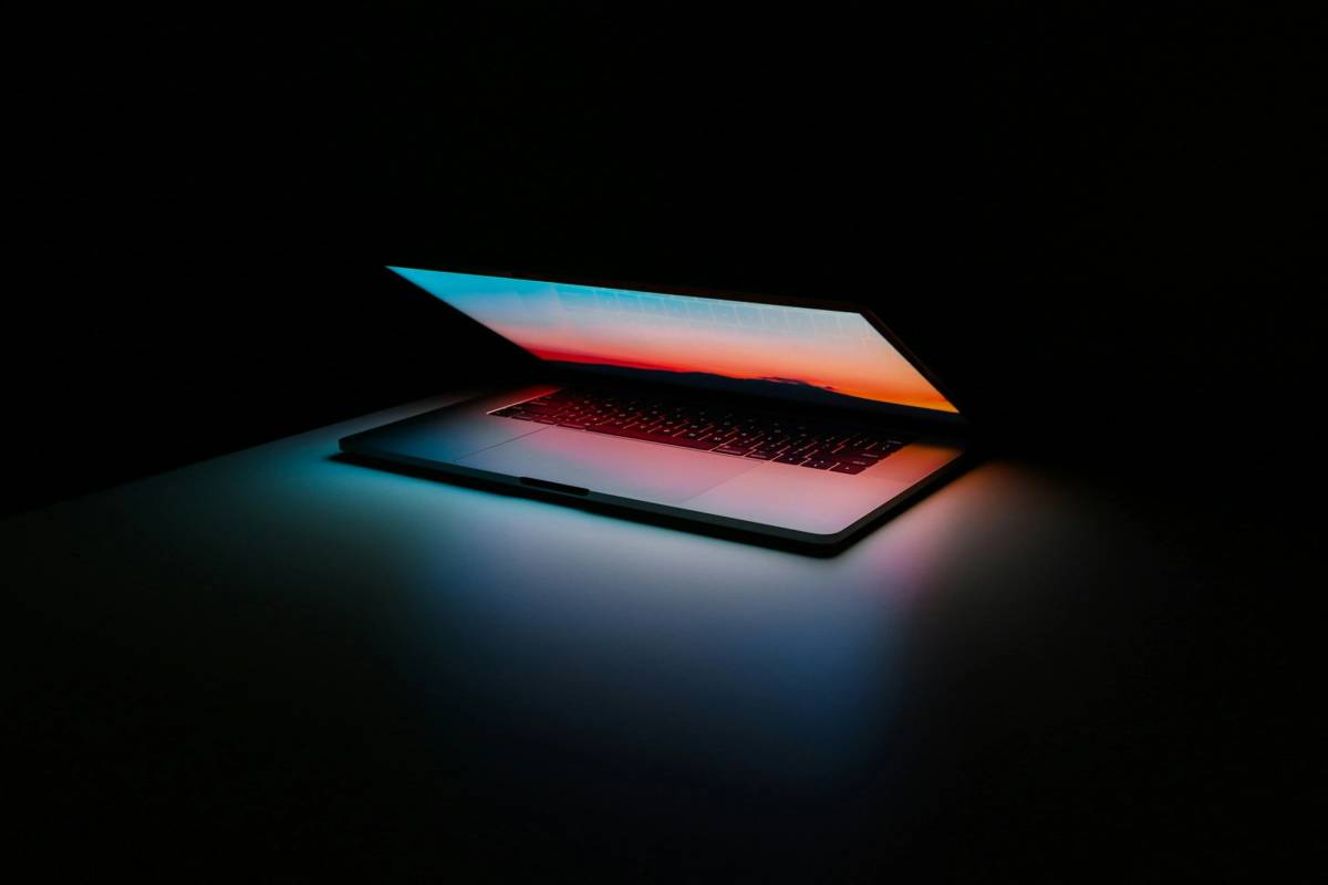 gray and black laptop computer on surface