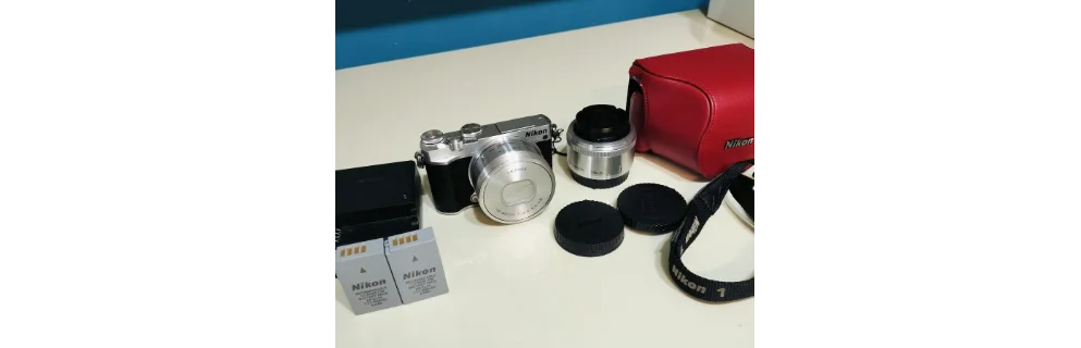 Nikon 1 J5 Mirrorless Interchangeable-Lens Camera with Double Lens and New Battery