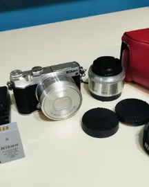 Nikon 1 J5 Mirrorless Interchangeable-Lens Camera with Double Lens and New Battery
