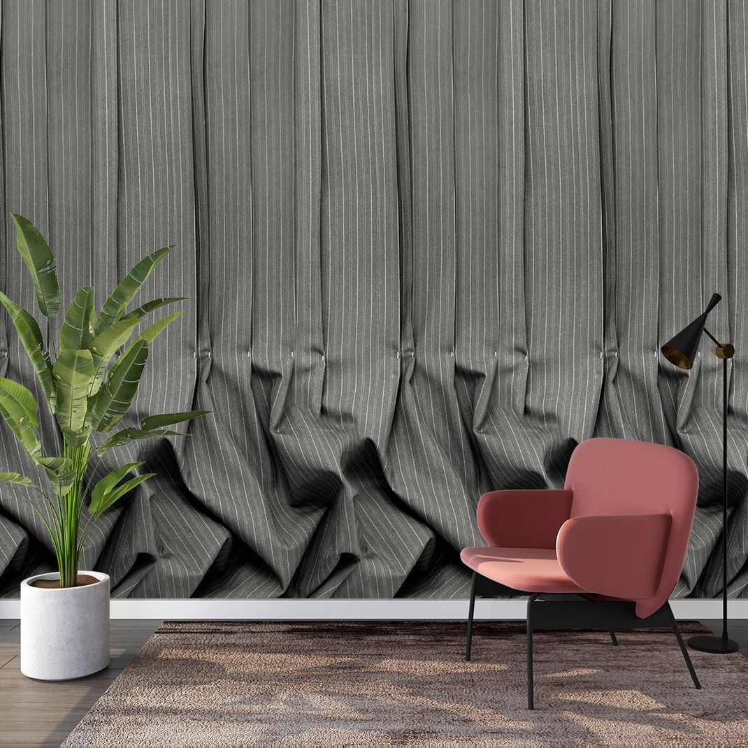 Grey wallpaper with folded textile