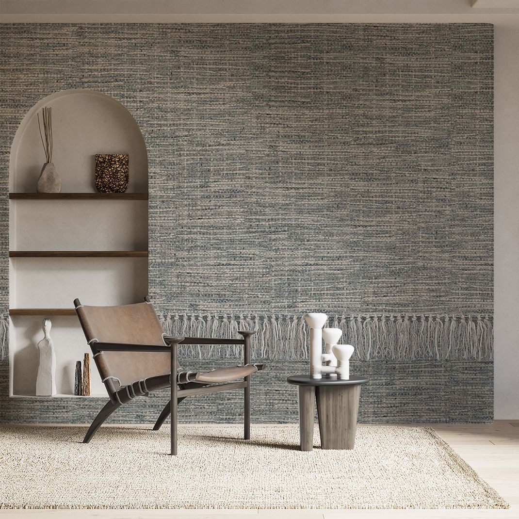 Grey wallpaper with large woven pattern and fringe