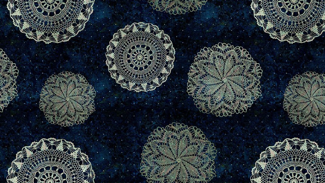 Dark blue wallpaper with round lace doilies