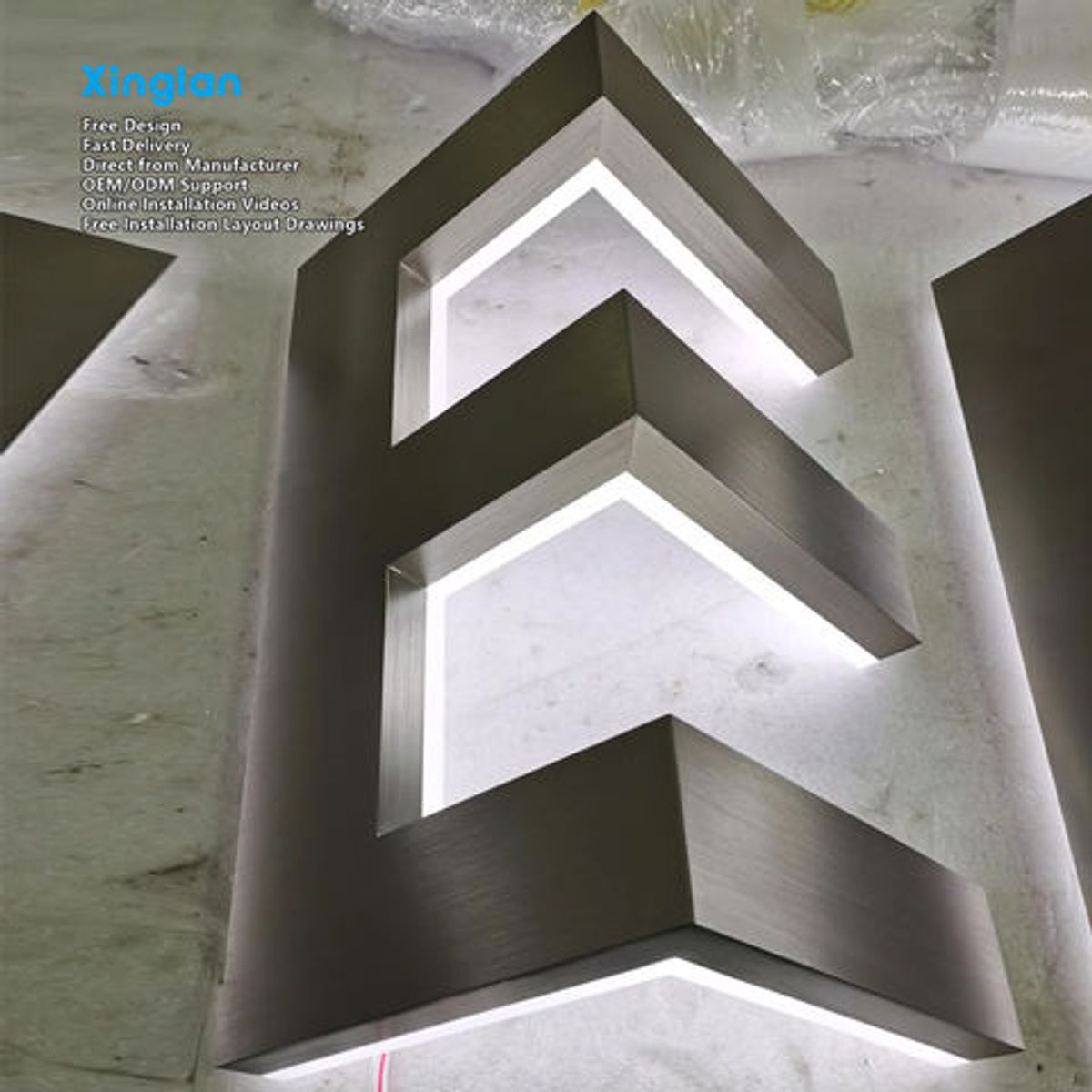 Precision-crafted stainless steel backlit letters Three-dimensional metal letters Custom illuminated storefront signage