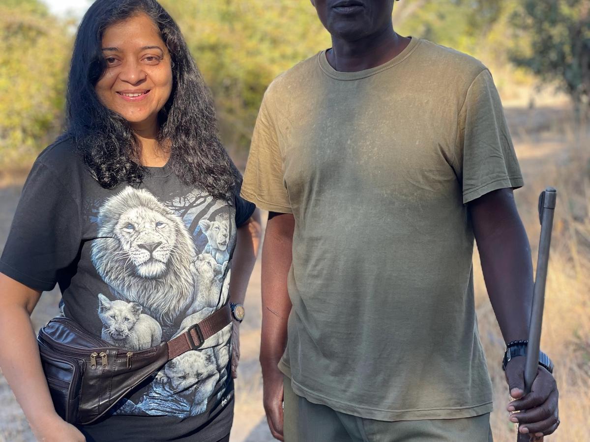 Hemakshi with armed walking safari guide