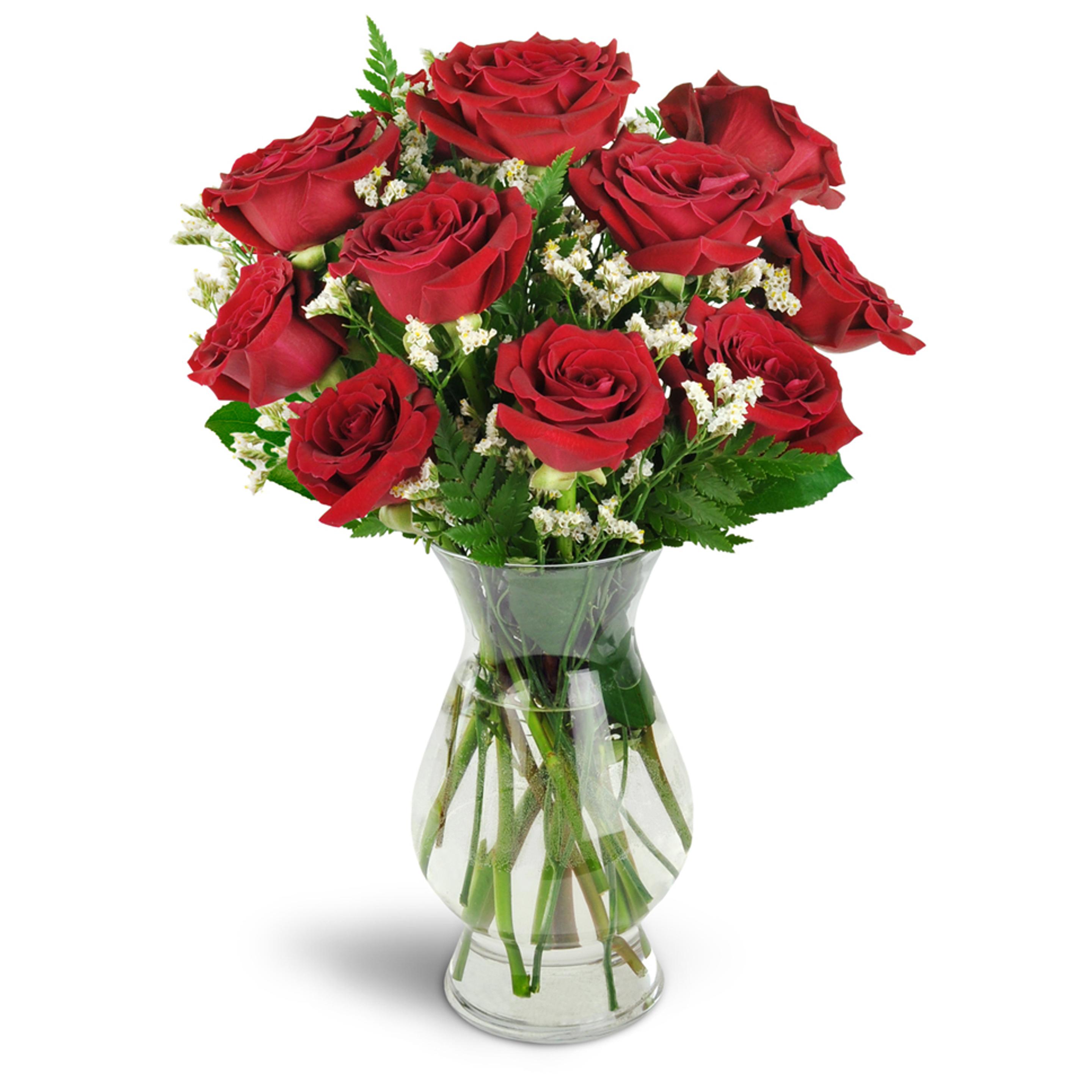 Red Roses in a clear vase to celebrate a romantic birthday
