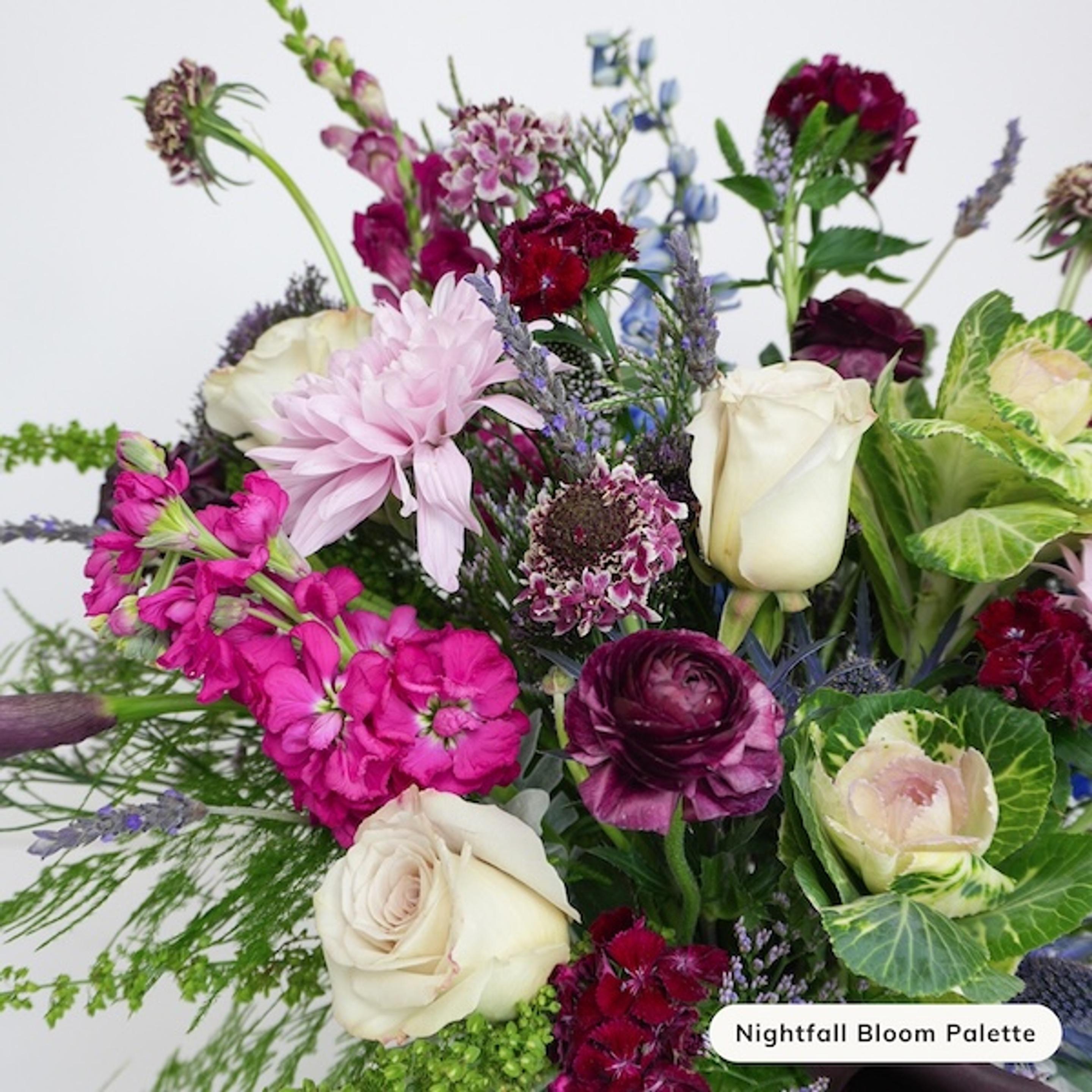 a close up of a bouquet of flowers on a table .