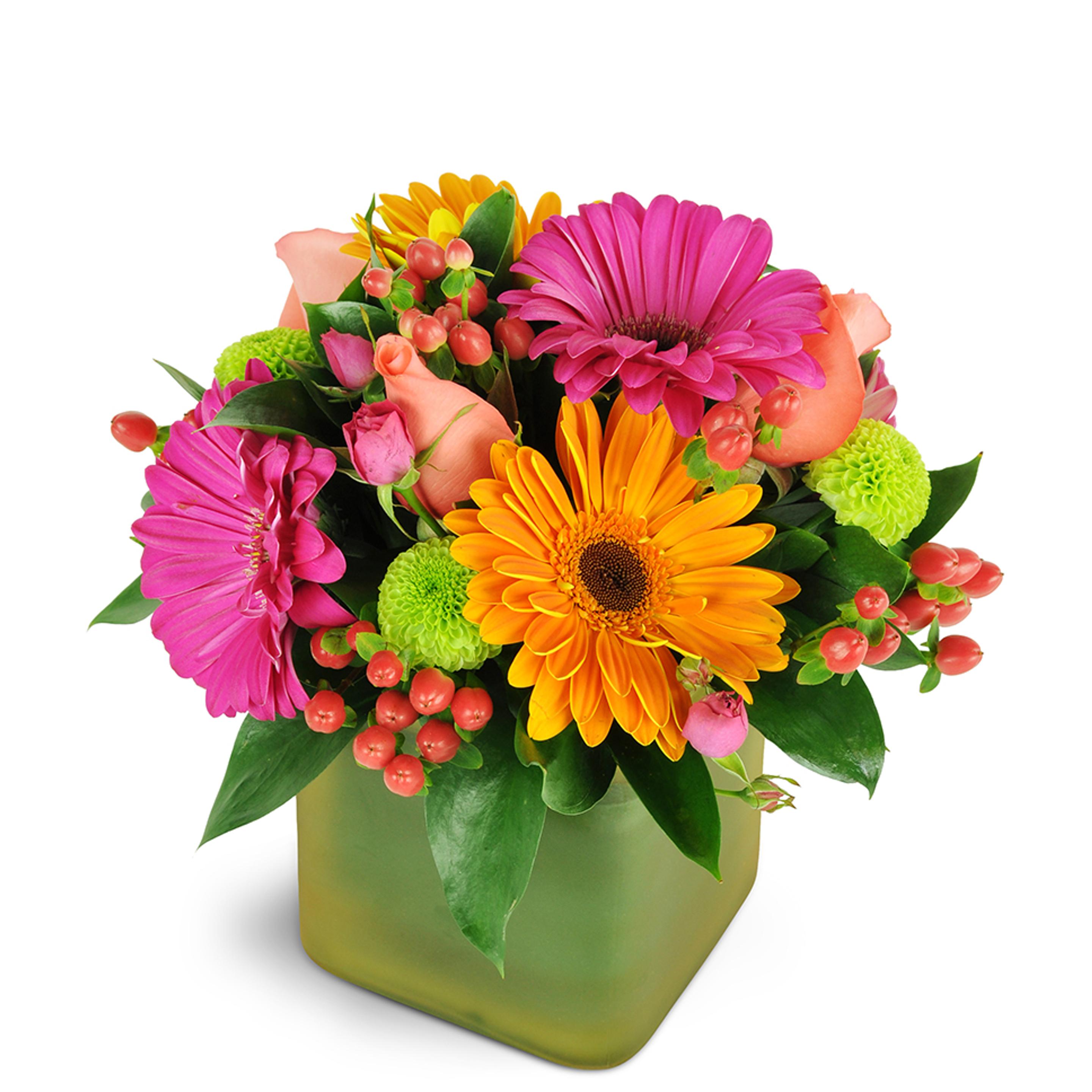 Beautiful bright flowers arranged in green vase to celebrate the arrival of a newborn.