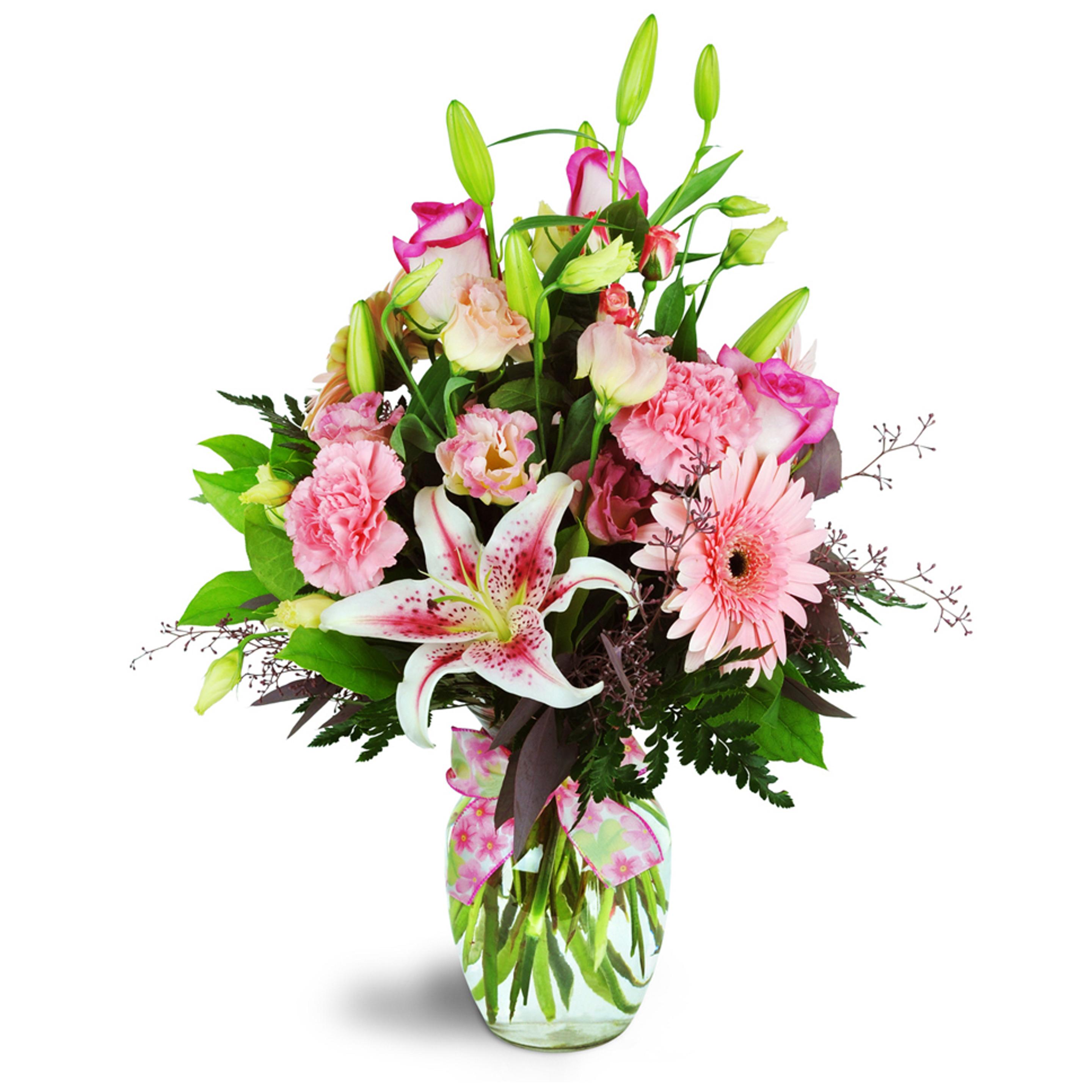 Lily flower arrangement in a clear vase