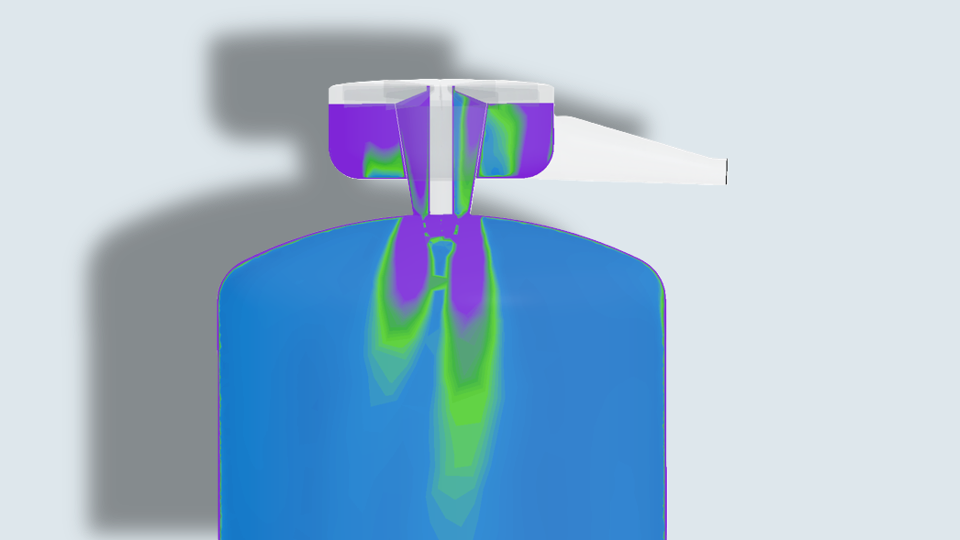 CFD cross-section of a spray dryer chamber showing atomizer inlet and drying gas flow, with a color gradient from purple to green to blue illustrating the distribution of temperature, velocity, or humidity from the nozzle into the drying chamber.