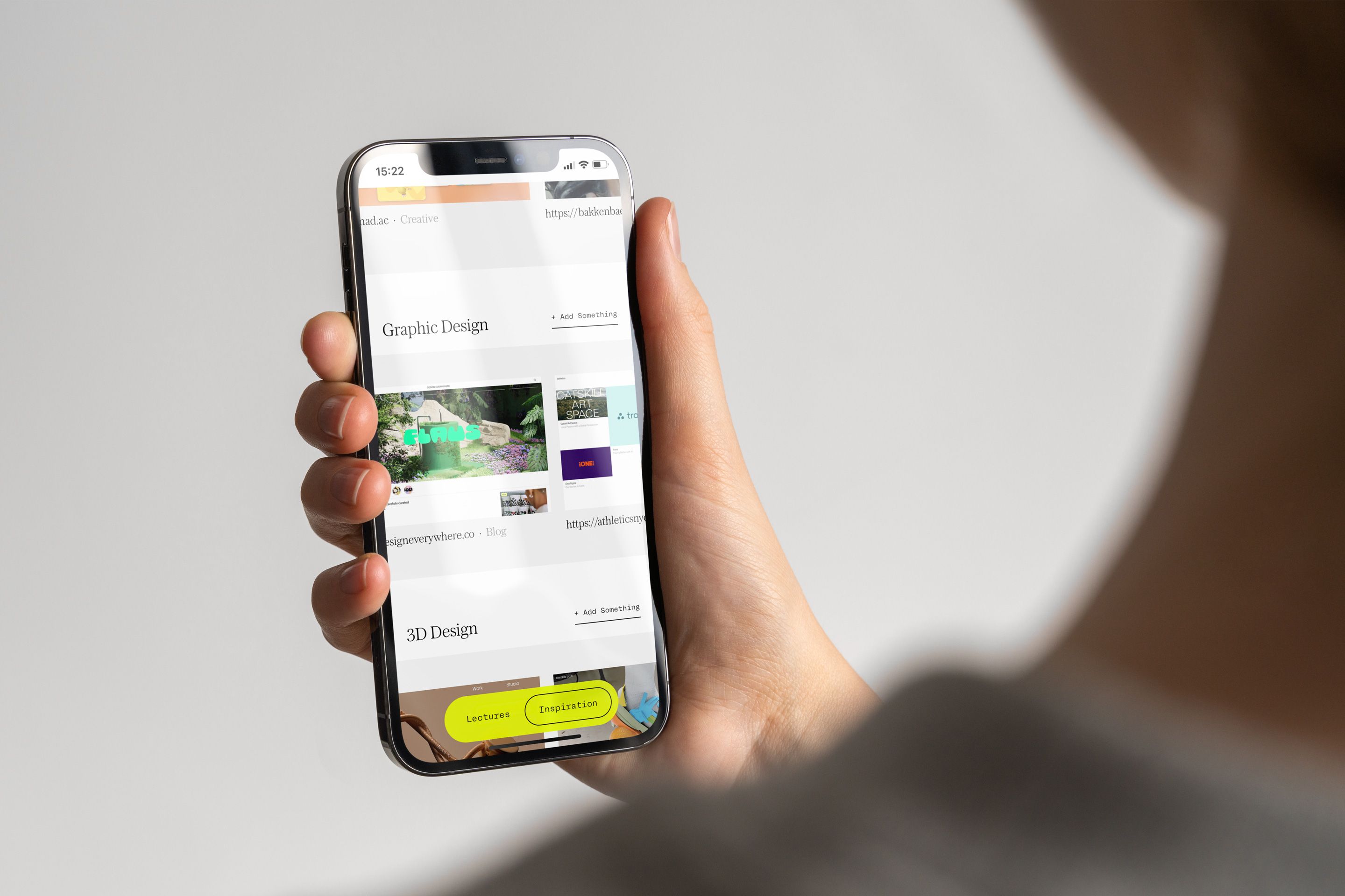 Woman holding smartphone and looking at digital platform