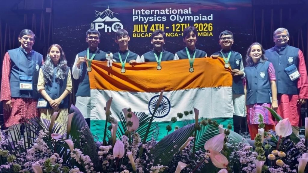 Indian team celebrating with the national flag at the 56th International Physics Olympiad (IPhO 2026) in Bucaramanga, Colombia
