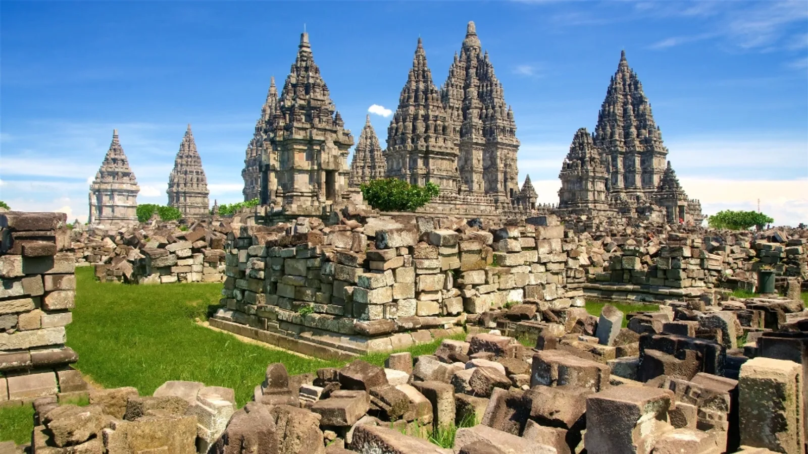 A panoramic view of the grand Prambanan temple towers and stone ruins