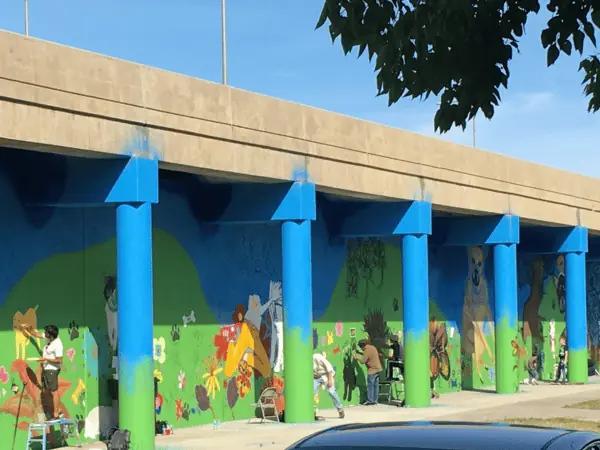 The mural of Logan Square Dog Park, one of the best Chicago dog parks