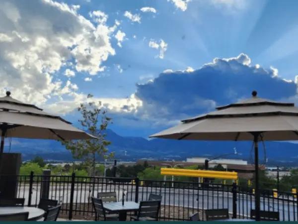 The stunning view from the outside of Basil & Barley Pizzeria Napoletana, a dog-friendly restaurant in Colorado Springs