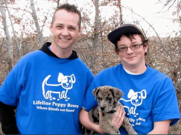 Volunteers at Lifeline Puppy Dog Rescue, a dog shelter in Denver that provides dog adoption services