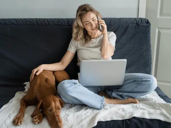 A pet parent calling Sploot Vet’s Tele-Triage for guidance on emergency vet services in Chicago and Denver