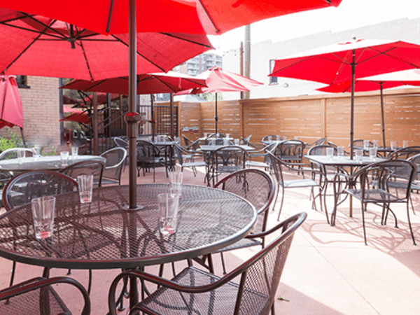 The spacious patio of Angelo’s Taverna, a dog-friendly restaurant in Denver