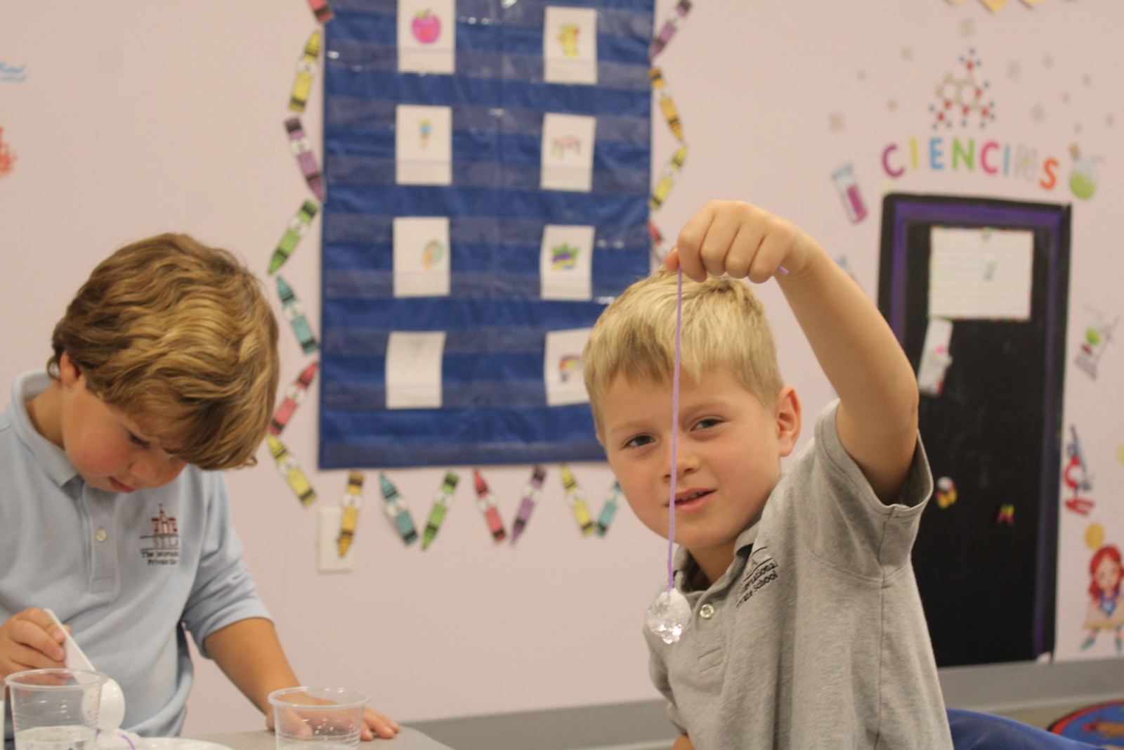 Early Global Education children explore an activity together during full Spanish immersion.