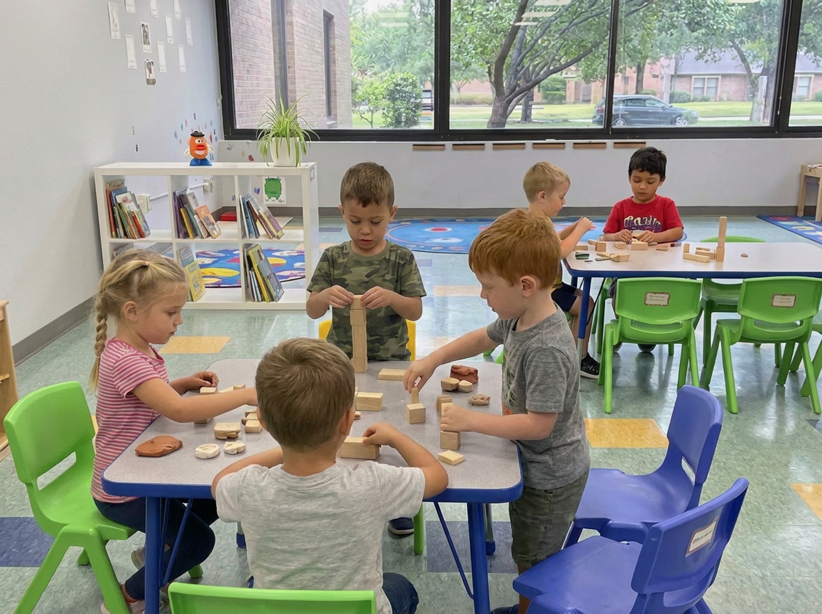 Children exploring a creative project together outside of class