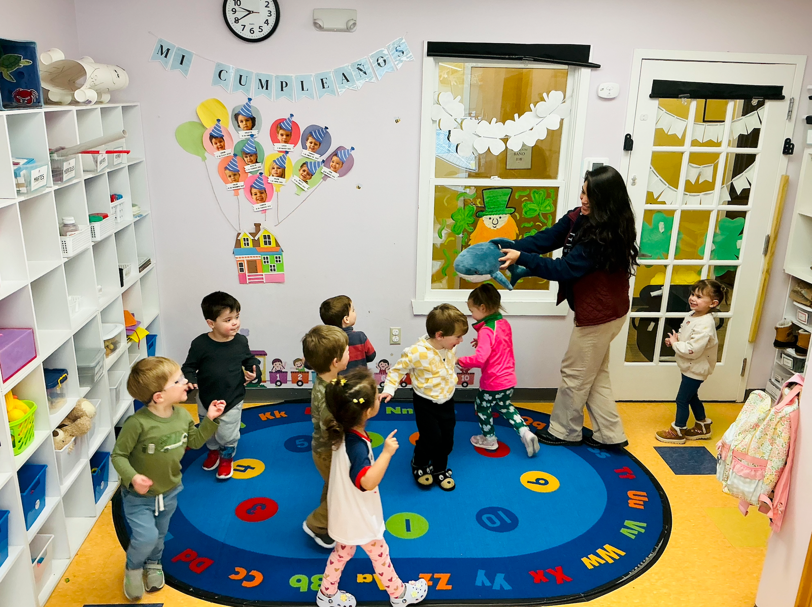 SELA students laughing together during an afterschool activity
