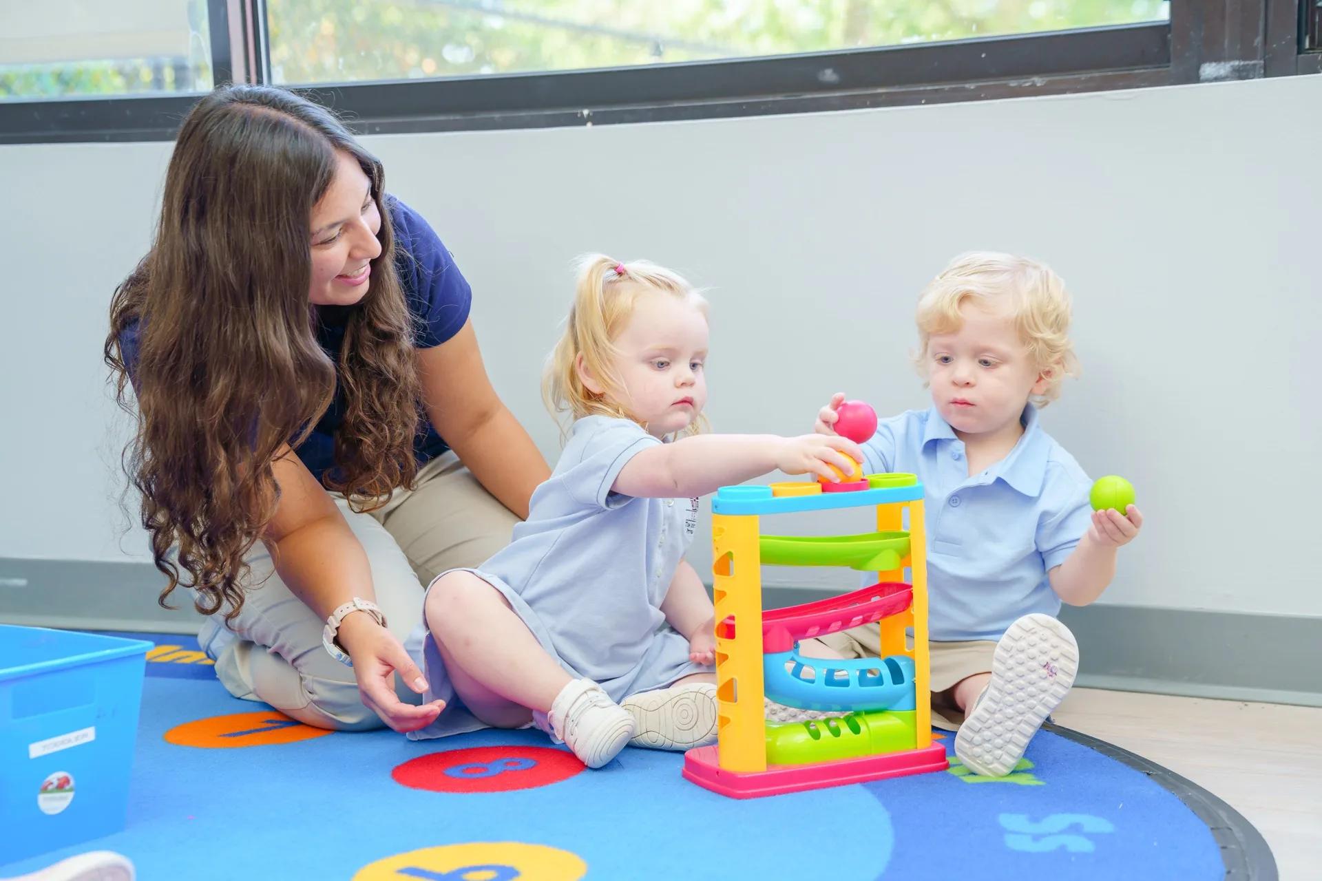 Toddler with teacher
