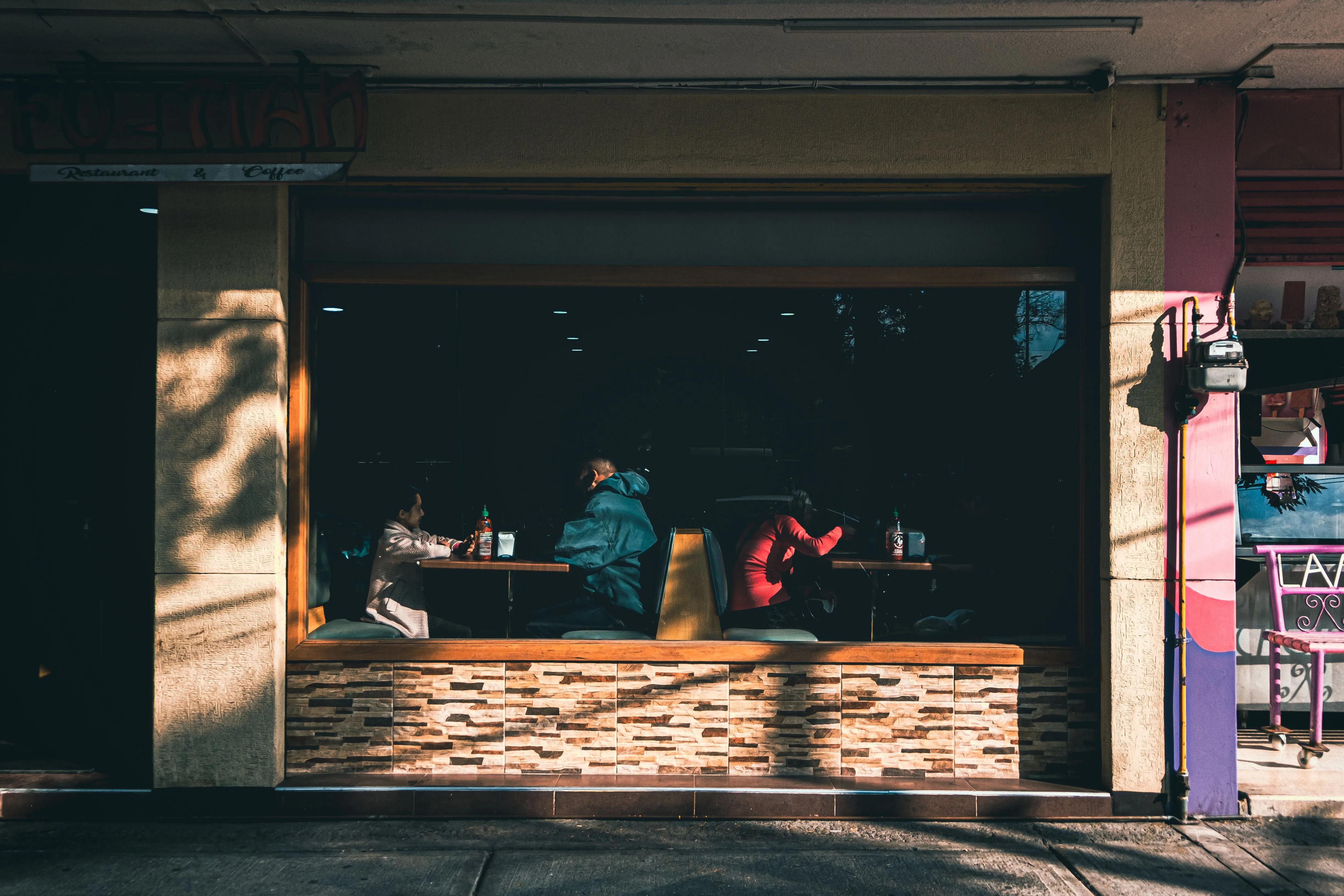 People dining inside a Mexico City restaurant, illustrating the global Pay What You Can Day initiative in 2026.