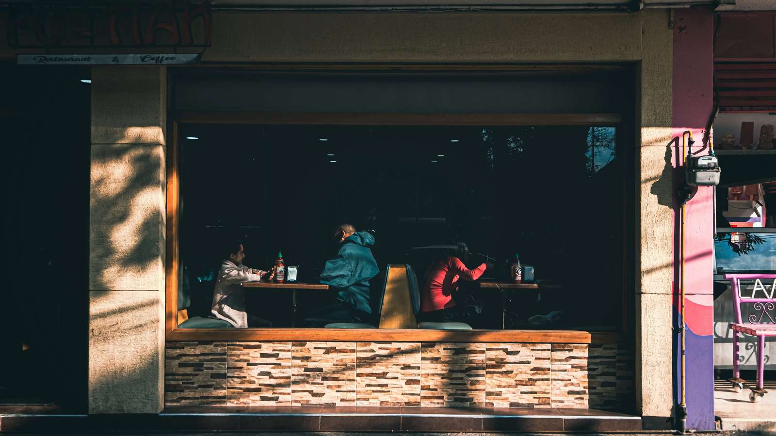 People dining inside a Mexico City restaurant, illustrating the global Pay What You Can Day initiative in 2026.