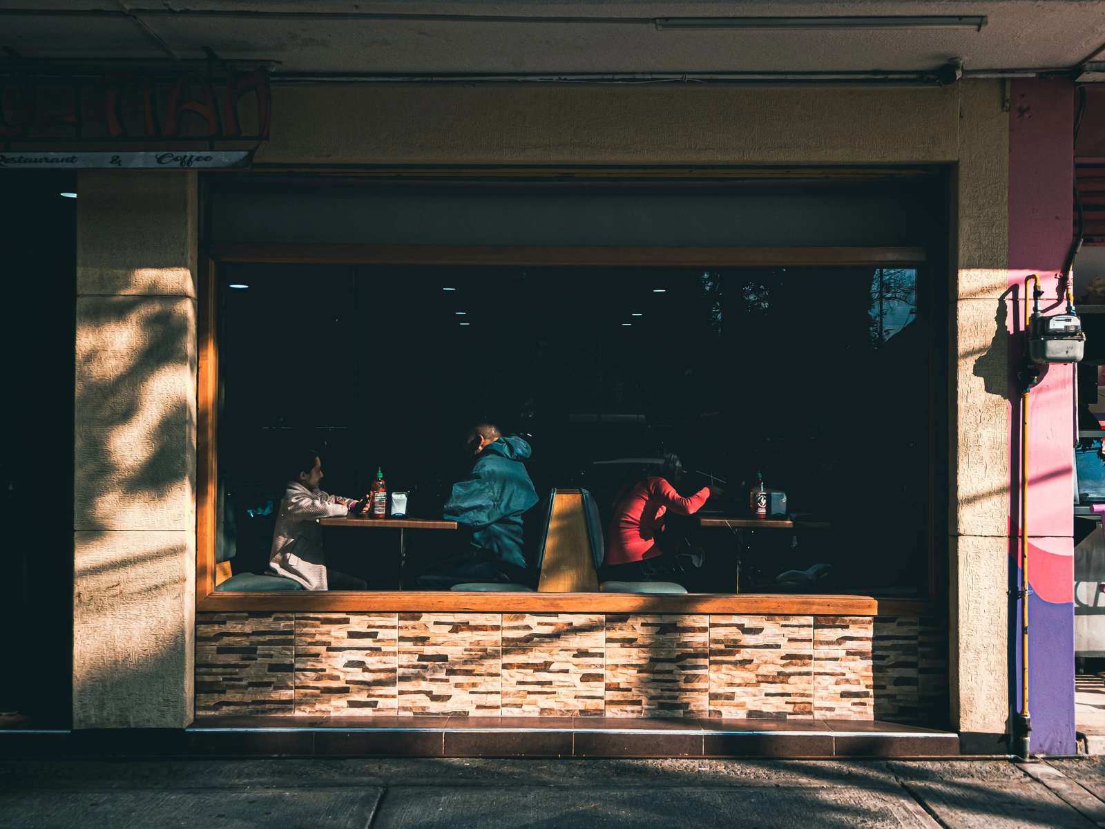 People dining inside a Mexico City restaurant, illustrating the global Pay What You Can Day initiative in 2026.