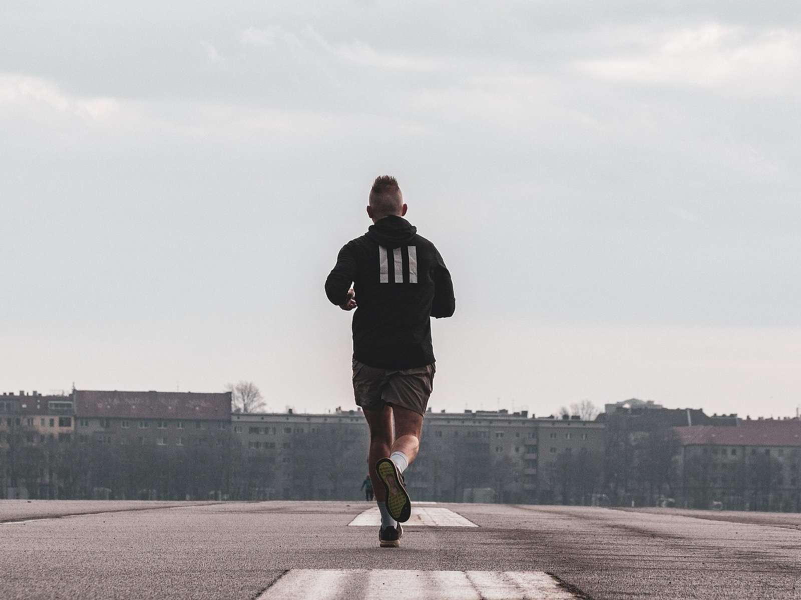 Runner on an open road