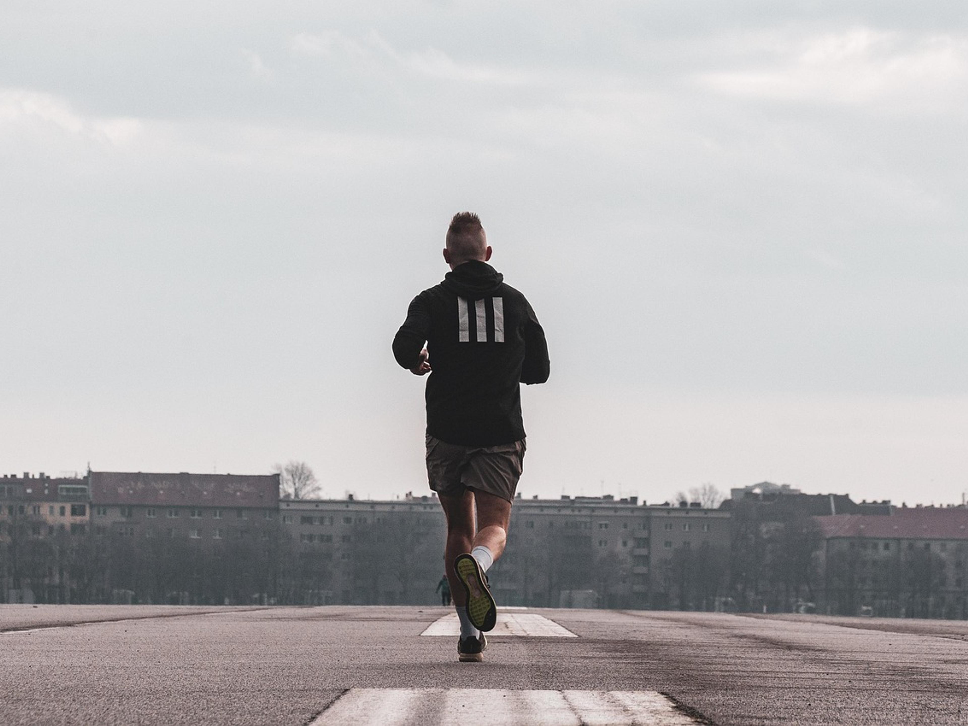 Runner on an open road