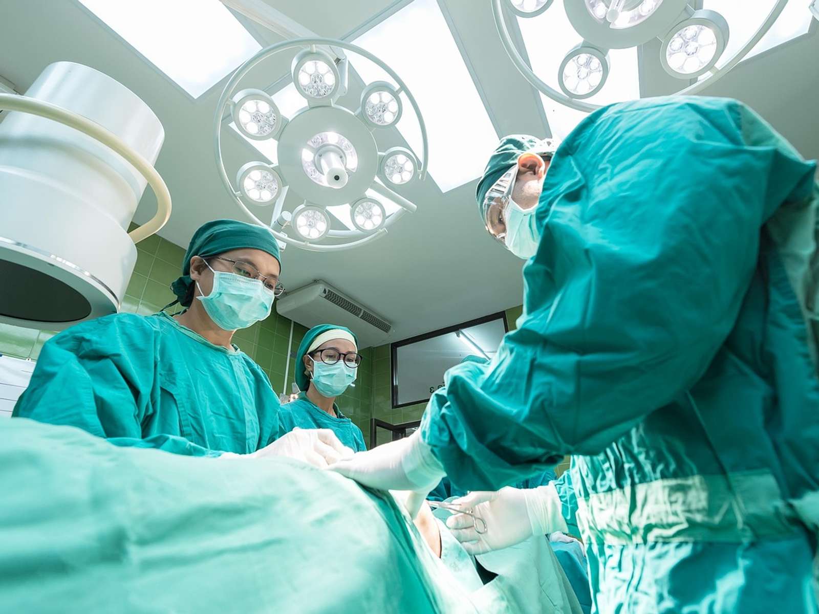 Surgeons at work in an operating room