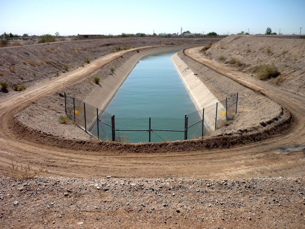 Water flowing through a narrow irrigation channel