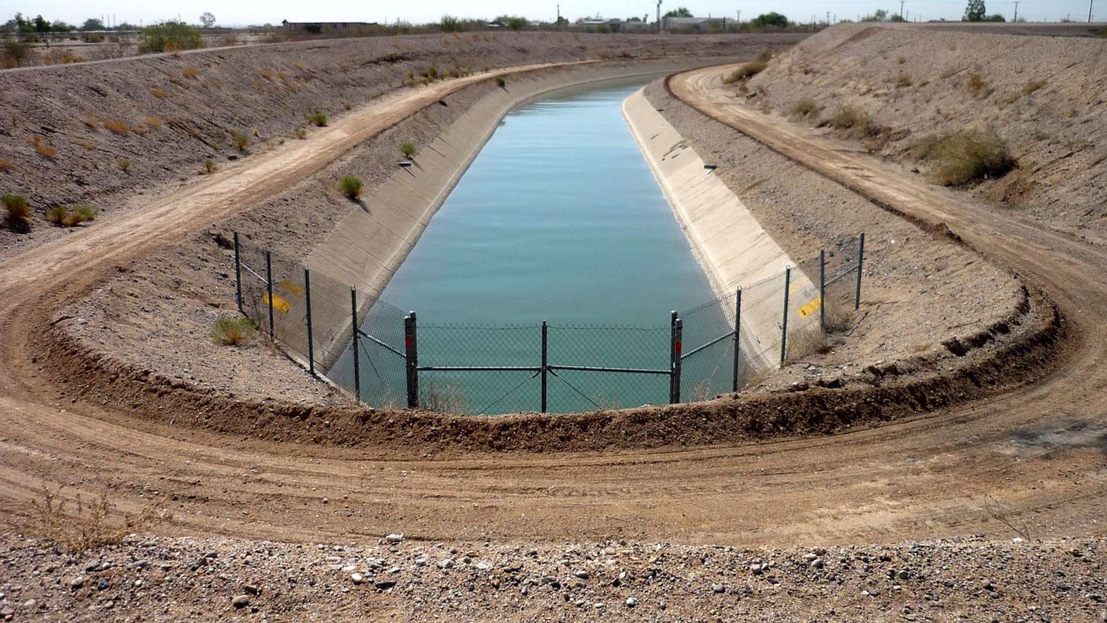 Water flowing through a narrow irrigation channel